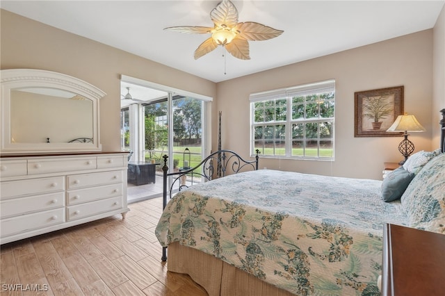 bedroom with access to outside, ceiling fan, and light wood-type flooring