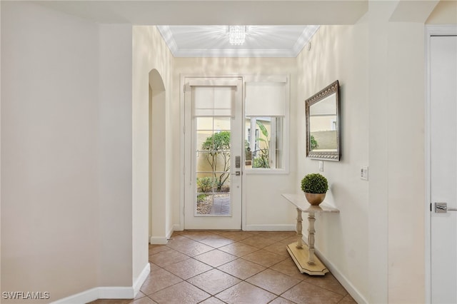 doorway featuring light tile patterned floors and crown molding