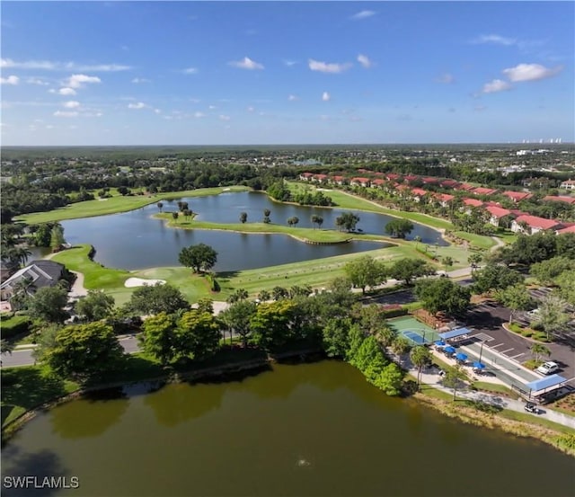 aerial view featuring view of golf course and a water view