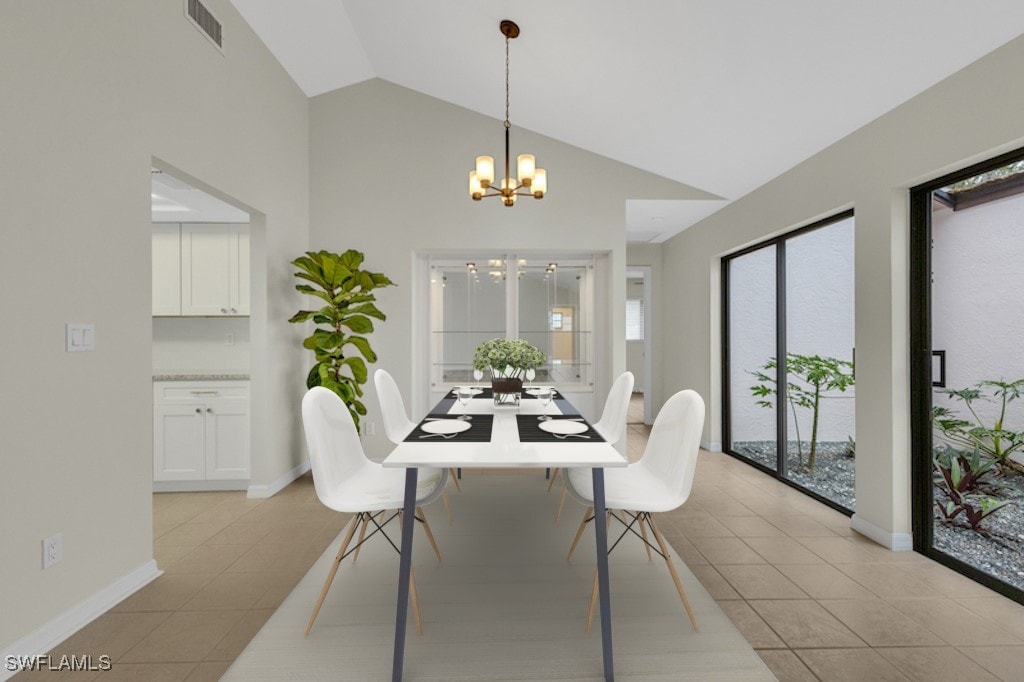 dining space featuring an inviting chandelier, light tile patterned floors, and lofted ceiling