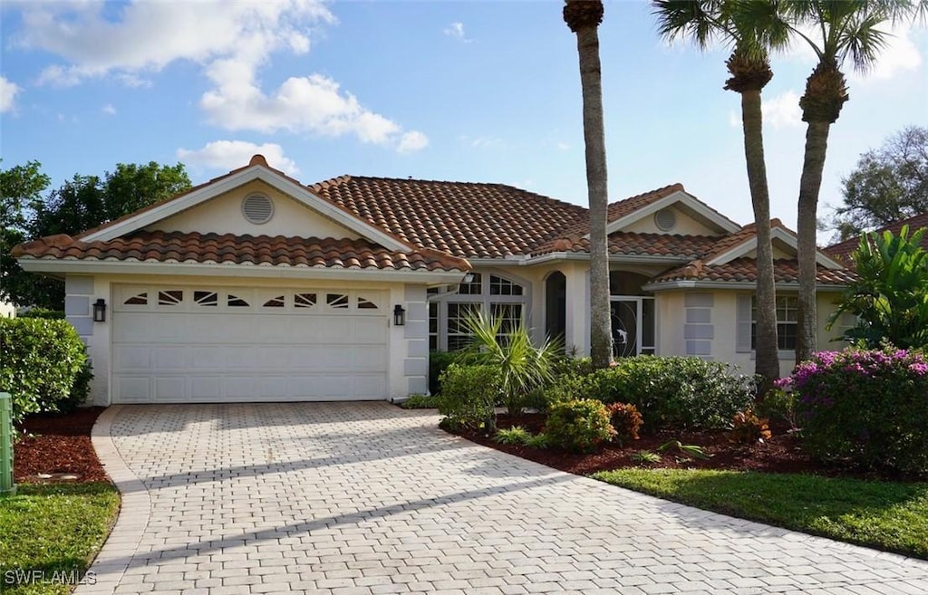 view of front of home with a garage