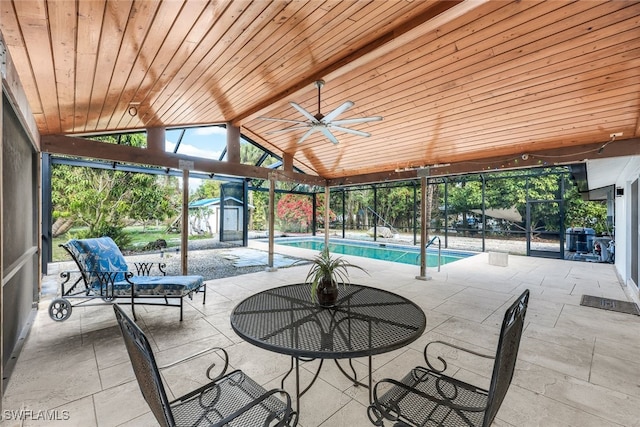 exterior space featuring ceiling fan