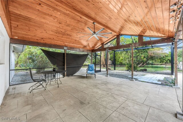 view of patio featuring ceiling fan