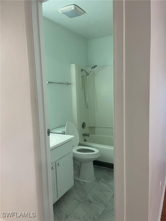 full bathroom with vanity,  shower combination, and toilet