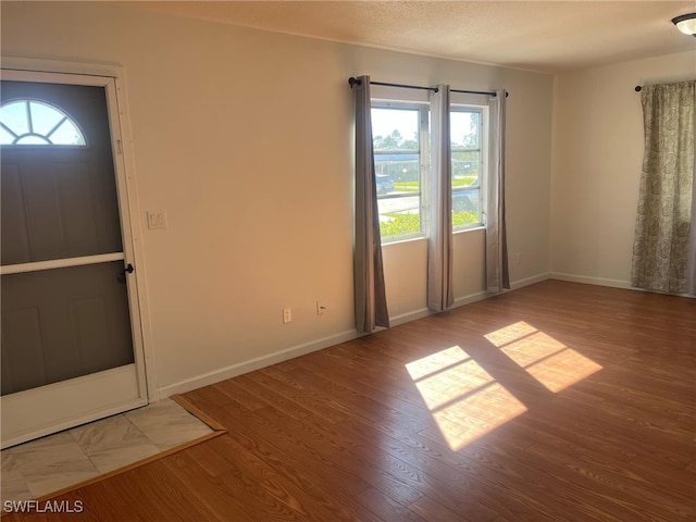 foyer featuring hardwood / wood-style floors