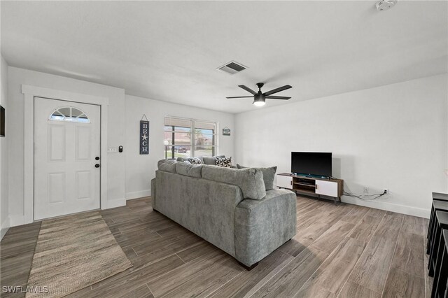 living room with ceiling fan