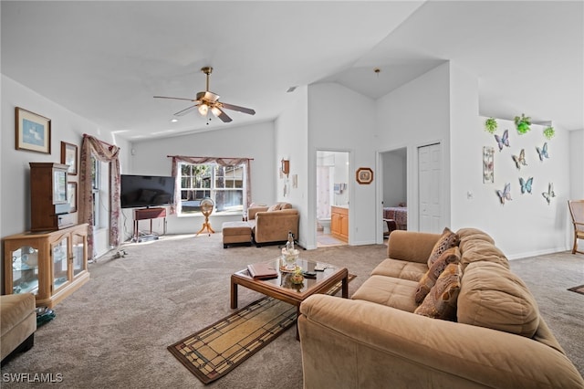 carpeted living room with vaulted ceiling and ceiling fan