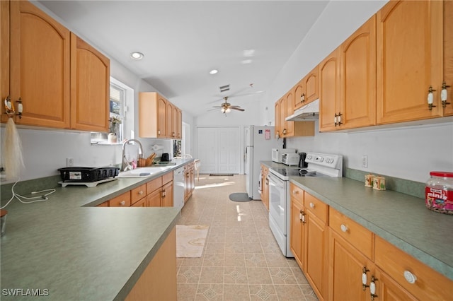 kitchen with kitchen peninsula, ceiling fan, white appliances, lofted ceiling, and sink