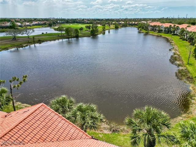 drone / aerial view with a water view