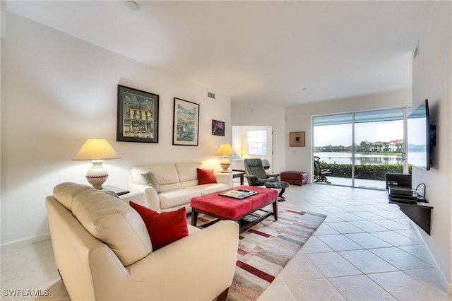 living room featuring light tile patterned floors