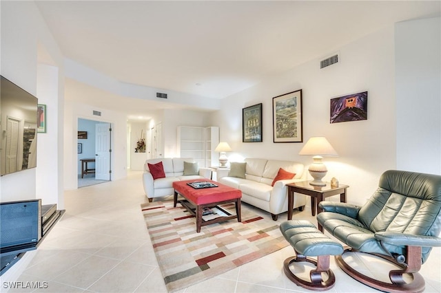 living room featuring light tile patterned floors