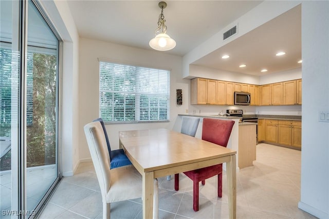 view of tiled dining space