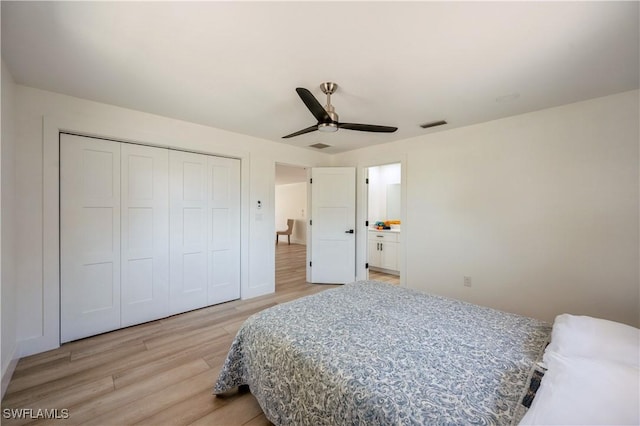 bedroom featuring ceiling fan, a closet, and light hardwood / wood-style flooring