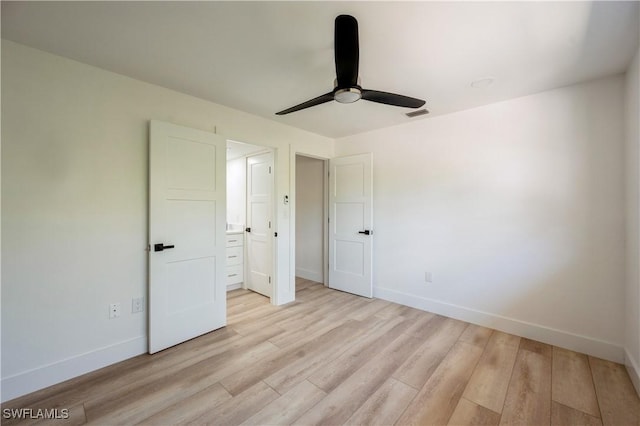 unfurnished bedroom featuring light hardwood / wood-style floors and ceiling fan