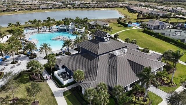 birds eye view of property featuring a water view