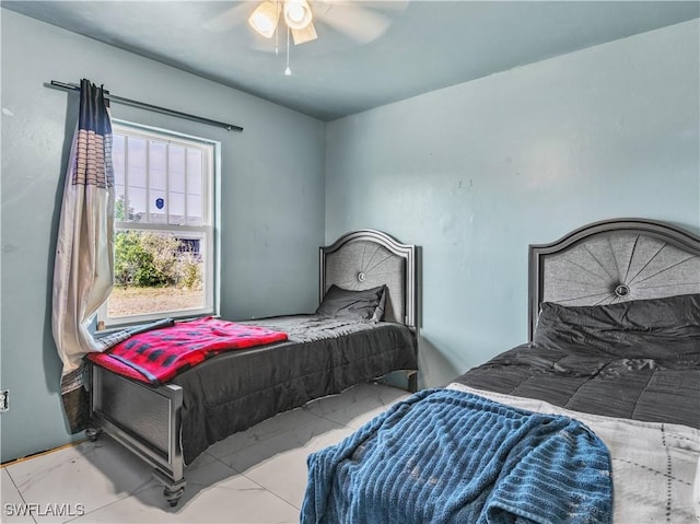 bedroom featuring ceiling fan