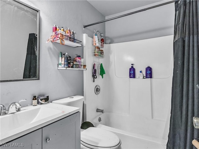 full bathroom featuring vanity, toilet, and shower / bath combo