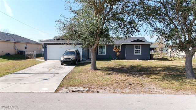 ranch-style house featuring a garage and a front yard