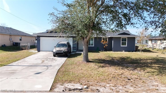 single story home with a garage and a front yard