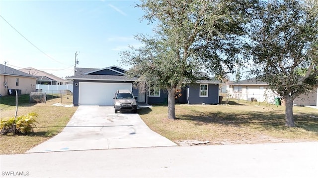 ranch-style home with a garage and a front yard