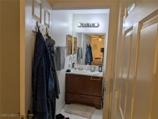 bathroom with tile patterned flooring and vanity