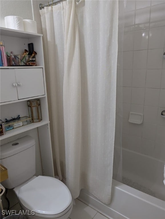 bathroom featuring toilet, tile patterned flooring, and shower / bathtub combination with curtain