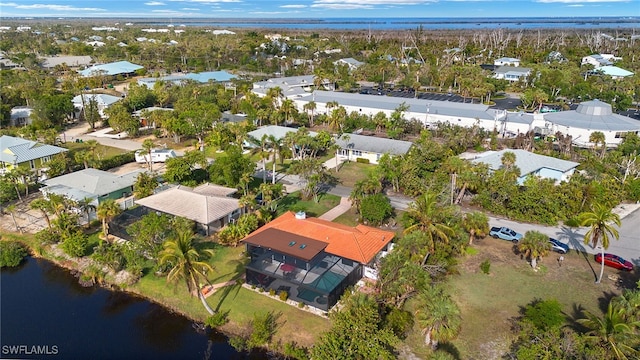 bird's eye view with a water view and a residential view