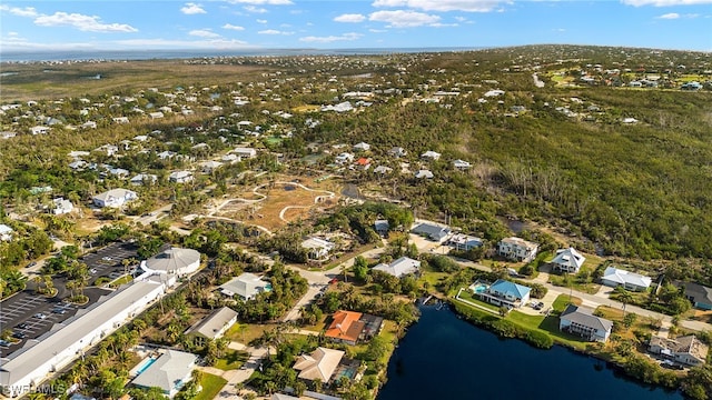 bird's eye view featuring a residential view and a water view