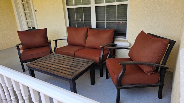 view of patio with a balcony