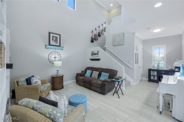 living room featuring crown molding