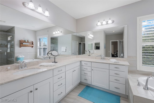 bathroom featuring vanity, tile patterned floors, and independent shower and bath