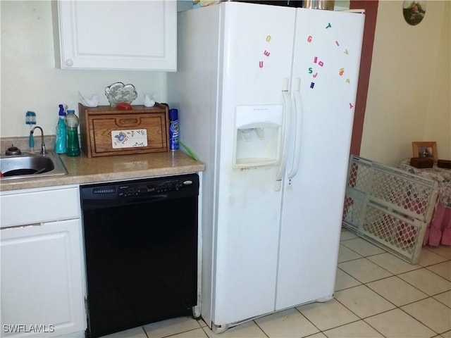 kitchen with white refrigerator with ice dispenser, white cabinets, sink, light tile patterned floors, and black dishwasher