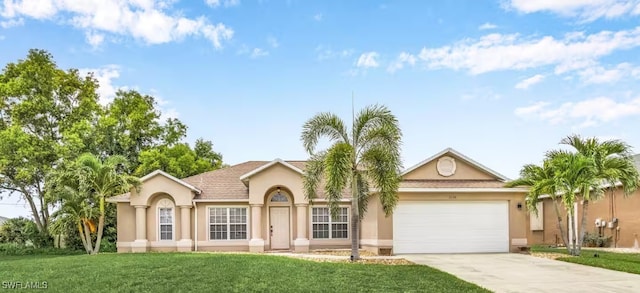 ranch-style house with a front lawn, stucco siding, driveway, and an attached garage