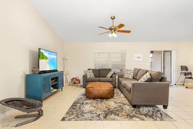 tiled living room with ceiling fan