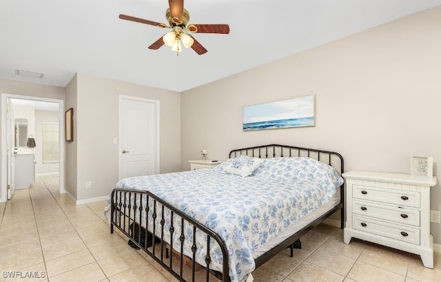 bedroom featuring ceiling fan and light tile patterned floors