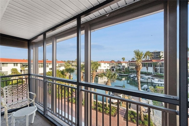 sunroom with a water view