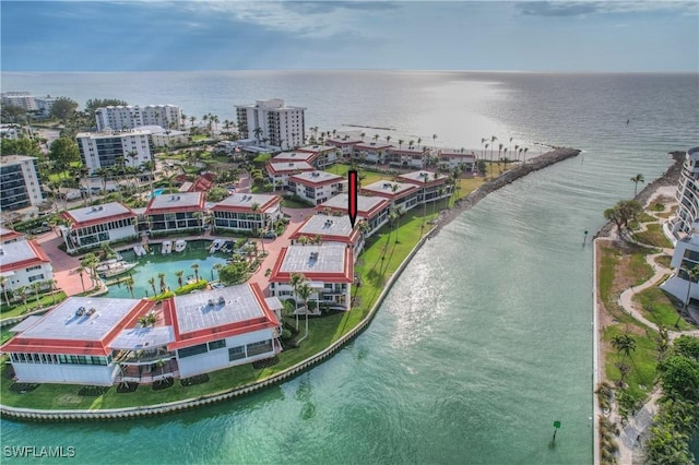 bird's eye view with a water view