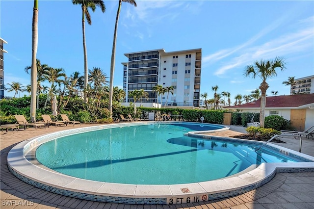 view of pool featuring a patio