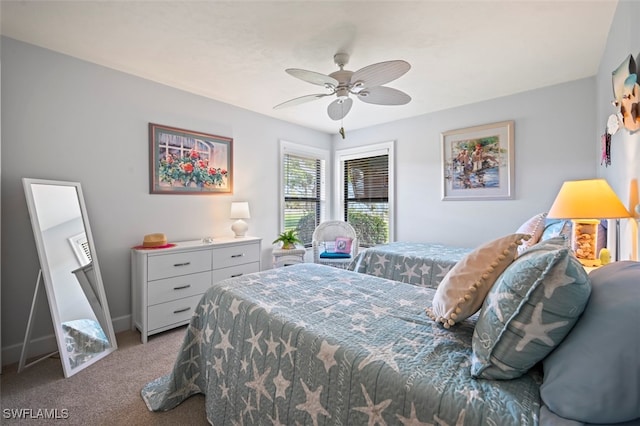 bedroom with light carpet and ceiling fan