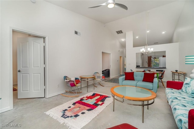 living room featuring ceiling fan with notable chandelier and high vaulted ceiling