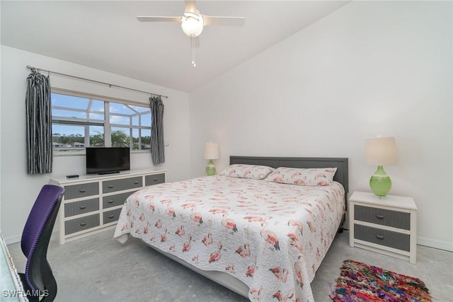 bedroom with ceiling fan, lofted ceiling, and concrete flooring