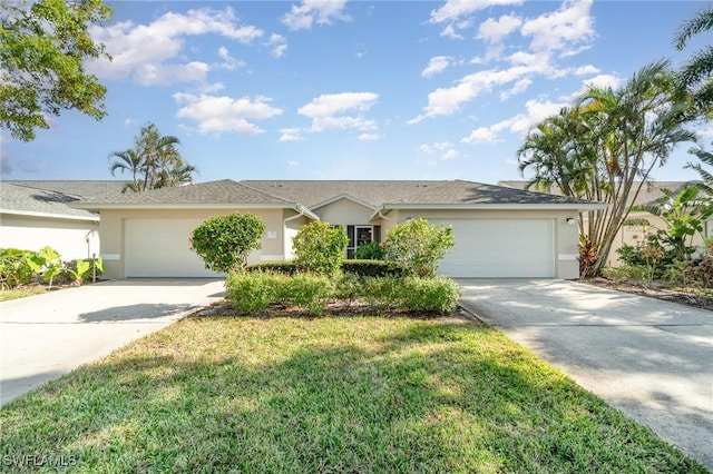 ranch-style house with a front yard and a garage