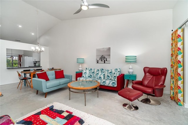 living room featuring ceiling fan with notable chandelier and lofted ceiling