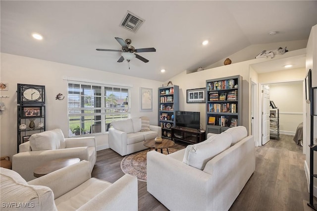 living room featuring ceiling fan, lofted ceiling, and dark hardwood / wood-style floors