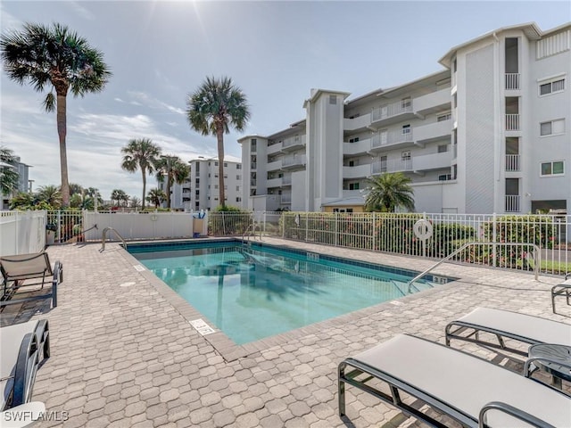 view of pool featuring a patio