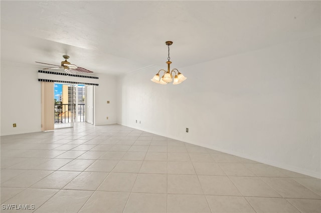 tiled empty room with ceiling fan with notable chandelier