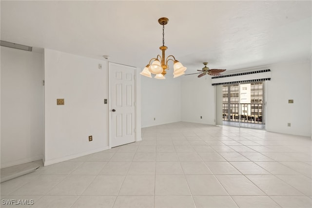 unfurnished room with ceiling fan with notable chandelier and light tile patterned floors