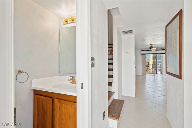 bathroom featuring vanity and tile patterned flooring