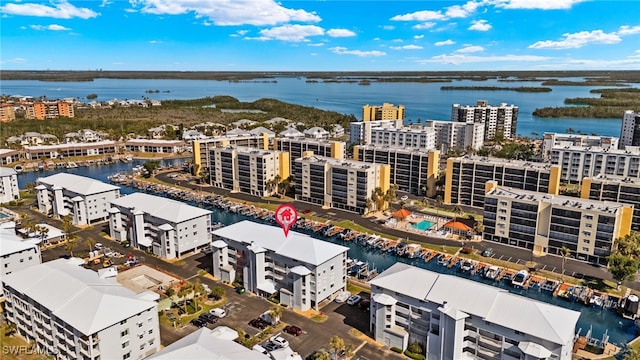 drone / aerial view with a water view