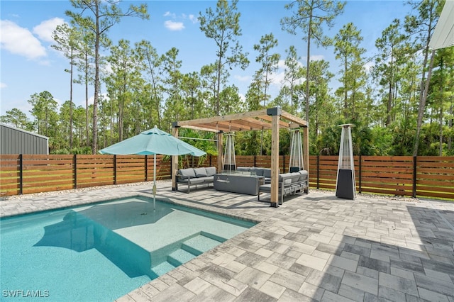 view of pool featuring a pergola, a patio area, and an outdoor living space